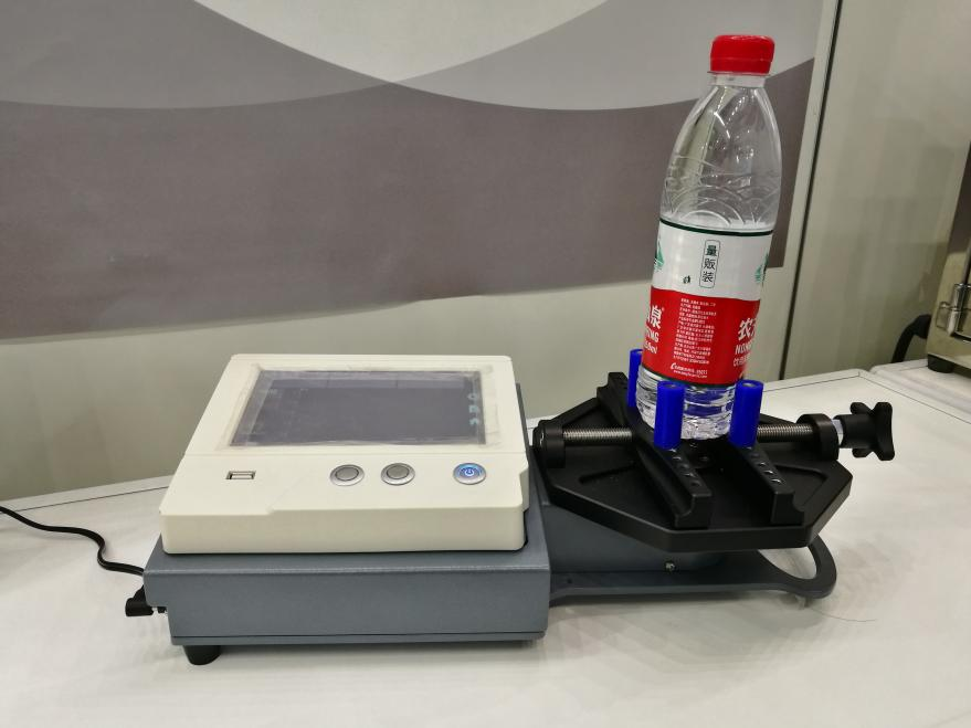 The bottle cap torque tester is a versatile measuring tool designed to test different types of bottle lid torque.